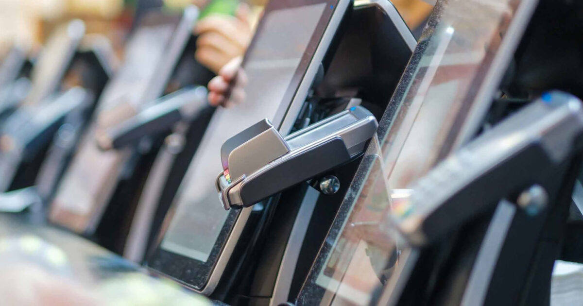 Row of restaurant point-of-sale payment terminals