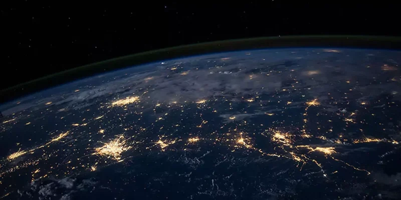 View of Earth from space showing city lights at night